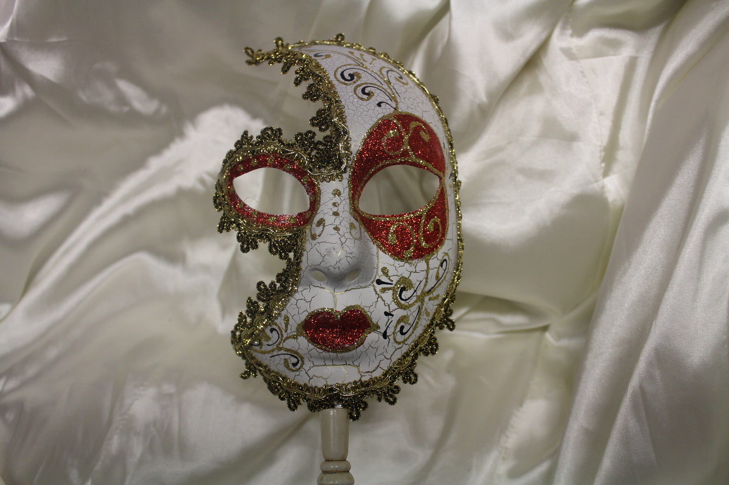 Red Handheld Jester Masquerade Mask