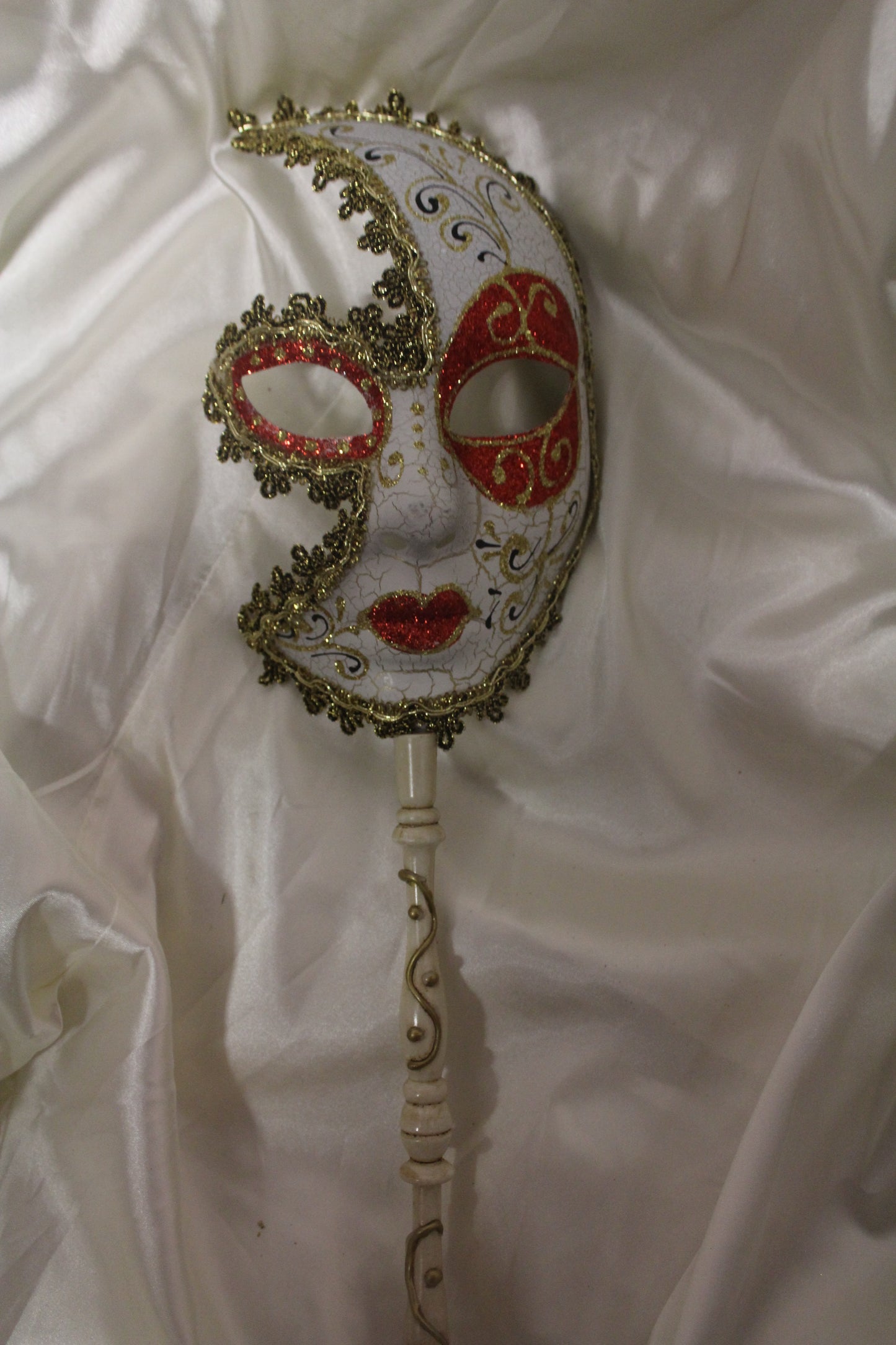 Red Handheld Jester Masquerade Mask