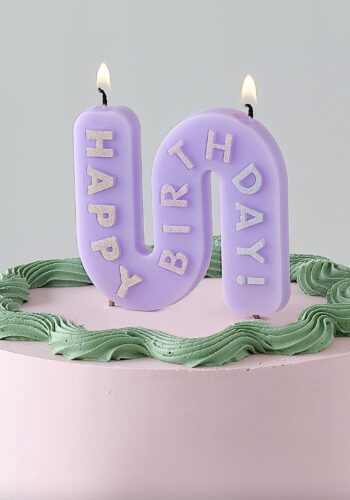 wavy purple birthday candle